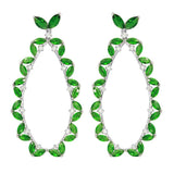 Sterling Silver Rhodium Plated Hanging Oval Shaped Earrings With Green And Clear CZ