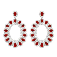 Load image into Gallery viewer, Sterling Silver Rhodium Plated Open Oval Shaped Hanging Earrings With Red And Clear CZ