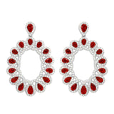 Sterling Silver Rhodium Plated Open Oval Shaped Hanging Earrings With Red And Clear CZ