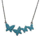 Sterling Silver Black Rhodium Plated Graduated Turquoise Stones Encrusted Butterfly Necklace