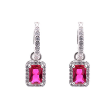 Load image into Gallery viewer, Sterling Silver Rhodium Plated Dangling Micro Pave Emerald Cut Red And Clear CZ Huggie Earring