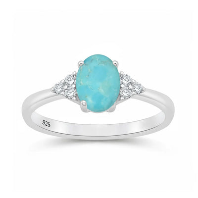 Sterling Silver Rhodium Plated 7mm Oval Turquoise And Clear CZ Ring
