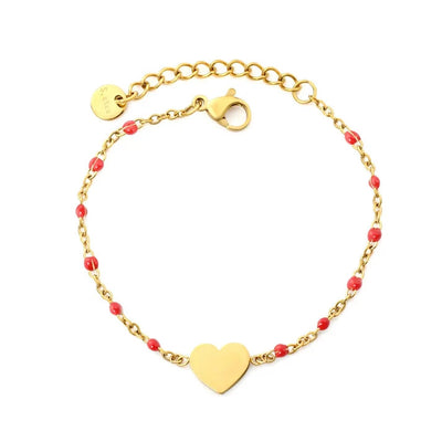 Stainless Steel Gold Color PVD Red Enamel Bead Smooth Heart Charm Bracelet With Round Tail Tag
