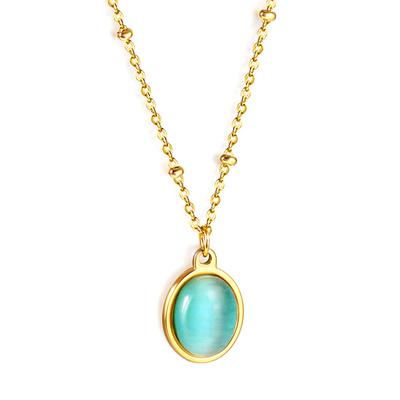 Stelluxe Stainless Steel Gold Color PVD Long Round Bead And Oval Blue CZ Pendant Necklace