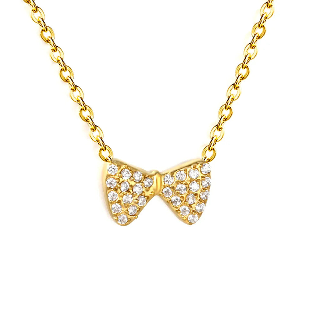 Tresoli Stainless Steel Gold Color PVD Bowknot Inlaid CNC White Zircon Flat Cross Chain Necklace