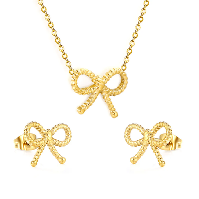 Stelluxe Stainless Steel Gold Color PVD Bow With Cross Chain Earrings And Necklace Set