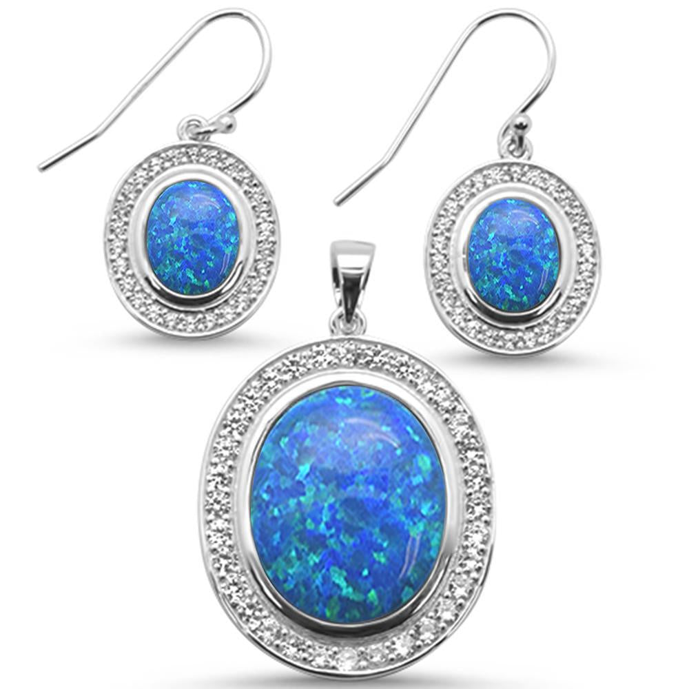 Sterling Silver Blue Opal And Cubic Zirconia Oval Earrings And Pendant Set