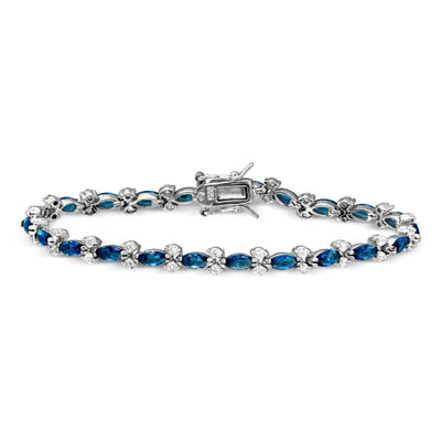 Sterling Silver Rhodium Plated Blue Marquise and Clear Round CZ Tennis Bracelet