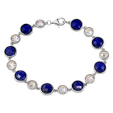 Sterling Silver Rhodium Plated Alternating Round Blue and Clear CZ Tennis Bracelet