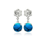 Sterling Silver Rhodium Plated Flower Earrings with Dangling Round Turquoise with Friction Back Post