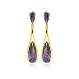 An Elegant Teardrop Design Dangling Earring Set in Sleek Gold Rhodium PlatedAnd With Purple Cz Stones. Earring Dimensions of 63.3MM x 14.9MM