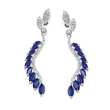 Load image into Gallery viewer, Sterling Silver Rhodium Plated Dangling Feather Earrings with Blue CZ