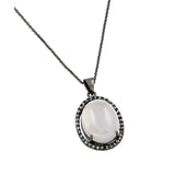 Sterling Silver Black Rhodium Plated Necklace with Centered Oval White Stone and Halo Set with Clear Czs PendantAnd Chain Length of 18  AdjustableAnd Pendant Dimensions: 25.8MMx18MM