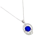 Rhodium Plated Sterling Silver Necklace with Clear CZ and Round Cut Blue Stone PendantAnd Chain Length of 16  Plus 1  Extension