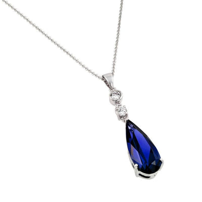 Sterling Silver Necklace with Round Clear Cz Connected with Dangling Solitaire Prong Set with Teardrop Cut Blue Sapphire Cz PendantAnd Chain Length of 16 -18  AdjustableAnd Pendant Dimensions: 10.3MMx46.8