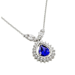 Sterling Silver Necklace with Elegant Pendant Centered with Pearshape Cut Blue Sapphire Cz and Halo Set with Clear CzsAnd Chain Length of 16  AdjustableAnd Pendant Dimensions: 32.4MMx19MM