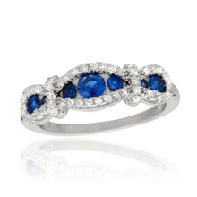 Load image into Gallery viewer, Sterling Silver Rhodium Plated Knotted Shaped Ring With Blue And CZ Stones