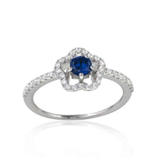 Load image into Gallery viewer, Sterling Silver Rhodium Plated Clover Micropave Ring with Blue Center CZ and Clear Round CZ