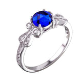 Sterling Silver Rhodium Plated Blue Oval CZ RingAnd Height 6mmAnd Width 9.4mm