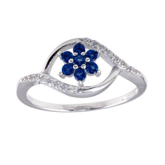 Sterling Silver Rhodium Plated Wave Blue Center Flower CZ Ring