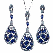 Load image into Gallery viewer, Sterling Silver Rhodium Plated Dangling Teardrop With Blue CZ Necklace and Earrings Set