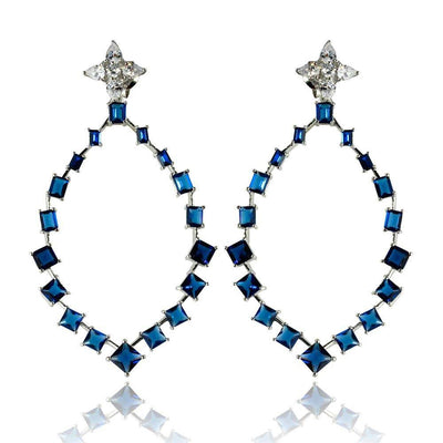 Sterling Silver Rhodium Plated Dangling Teardrop Earrings With Blue And Clear CZ