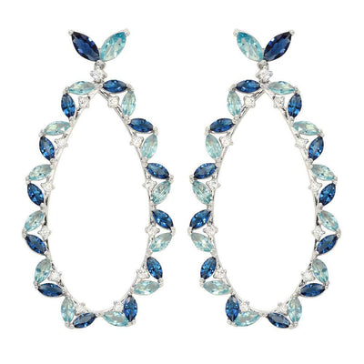 Sterling Silver Rhodium Plated Hanging Oval Shaped Earrings With Blue And Clear CZ