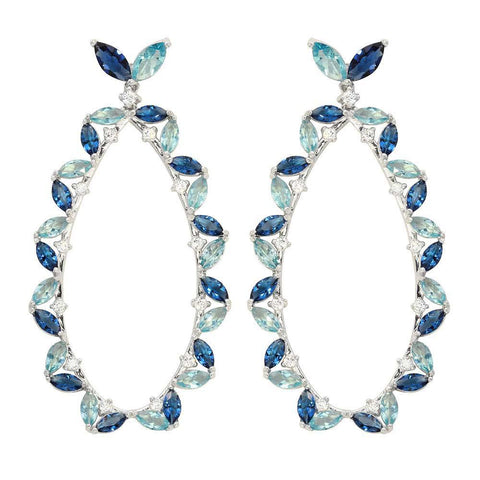 Sterling Silver Rhodium Plated Hanging Oval Shaped Earrings With Blue And Clear CZ