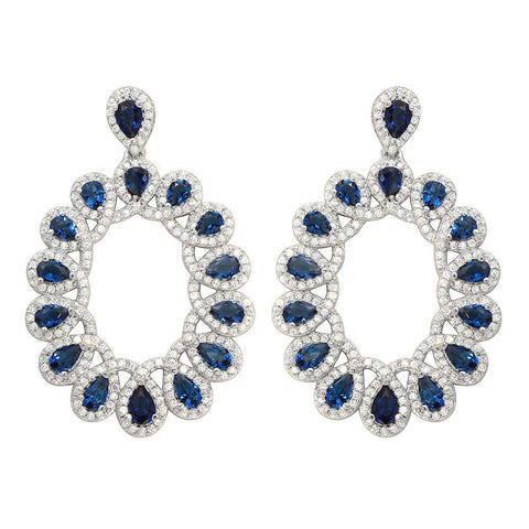 Sterling Silver Rhodium Plated Open Oval Shaped Hanging Earrings With Blue And Clear CZ