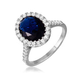 Sterling Silver Rhodium Plated Blue Oval Halo .925 Ring With CZ StonesAnd Dimensions 13.3mm