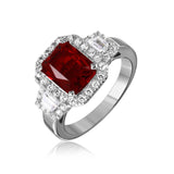 Sterling Silver Rhodium Plated Emerald Cut Shaped Ring With Red And Clear CZ Stones