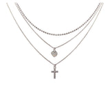 Sterling Silver Rhodium Plated Triple Chain Heart and Cross Necklace with CZ