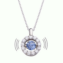Load image into Gallery viewer, Sterling Silver Rhodium Plated Open Round Dancing Blue CZ Pendant Necklace