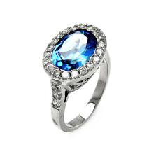 Load image into Gallery viewer, Sterling Silver Centered Oval Cut Blue Cz with Paved Halo Setting Fancy Band RingAnd Ring Dimensions of 17MMx13MM