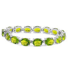 Load image into Gallery viewer, Sterling Silver Classy Oval Four Prong Set with Peridot Cz Tennis BraceletAnd Length of 7.5