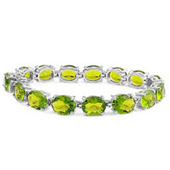 Sterling Silver Classy Oval Four Prong Set with Peridot Cz Tennis BraceletAnd Length of 7.5