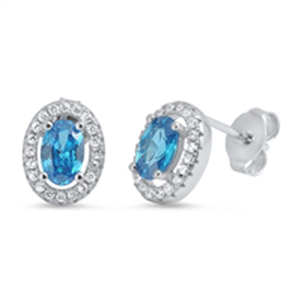 Sterling Silver Oval Shape With Blue Topaz And CZ EarringsAnd Face Height 10mmx7mm
