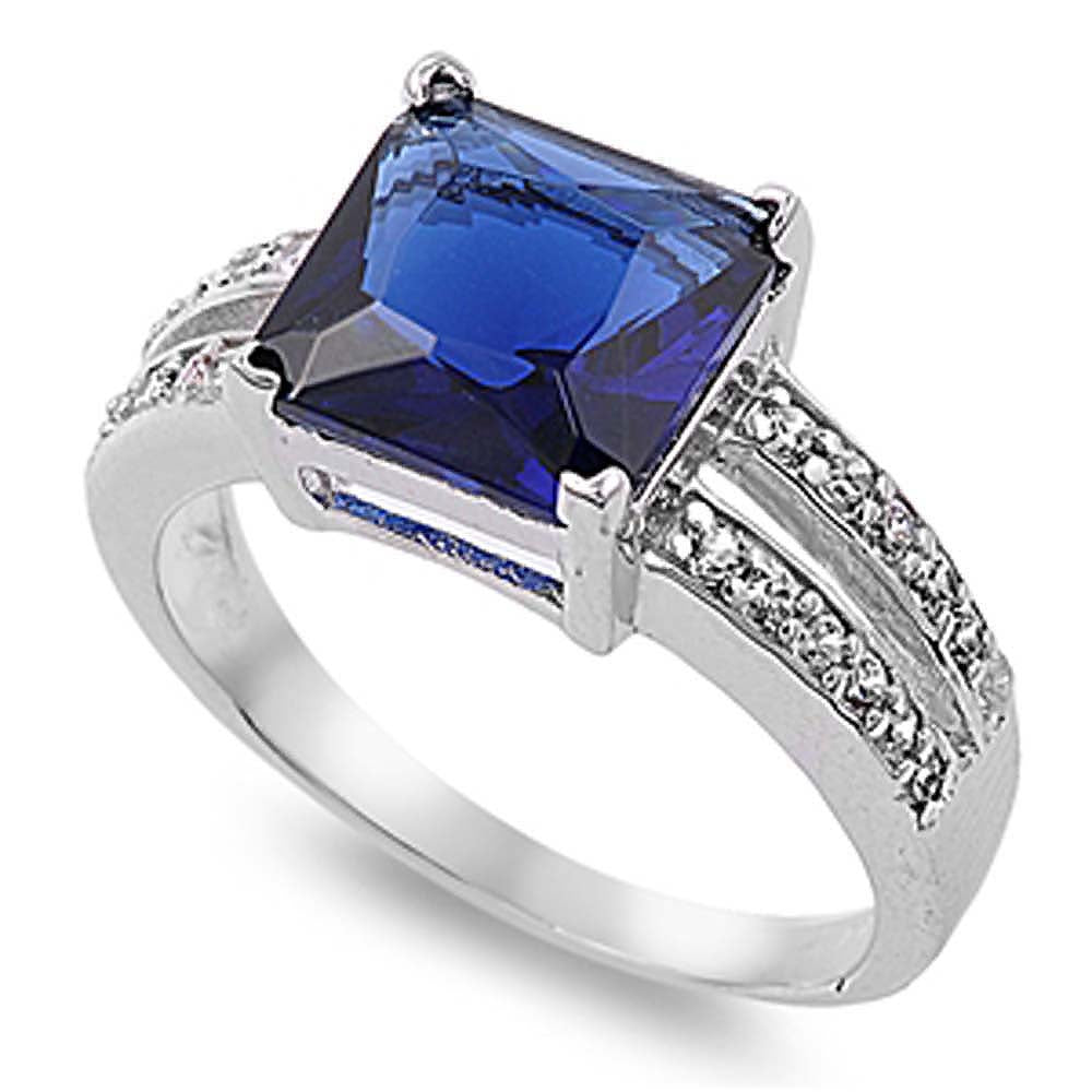 Sterling Silver Rhodium Plated Blue Sapphire Princess Cut Shaped Clear CZ RingAnd Face Height 11mmAnd Band Width 3mm