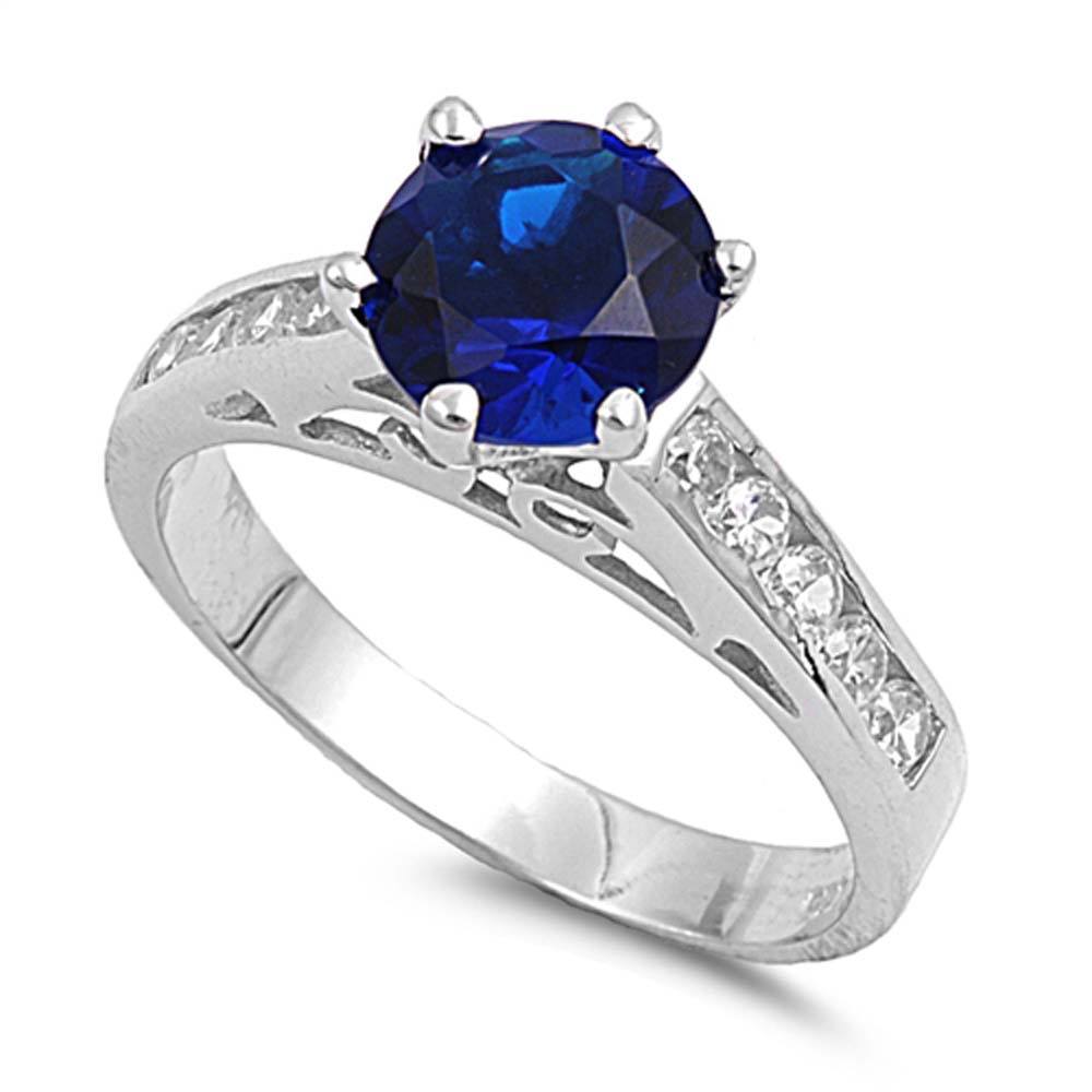Sterling Silver Blue Sapphire Round Shaped Clear CZ RingAnd Face Height 7mmAnd Band Width 3mm