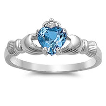 Load image into Gallery viewer, Sterling Silver Claddagh Crown Heart Ring with Centered Blue Topaz Heart Simulated Diamond &amp; Small Clear Simulated Diamond on CrownAnd Face Height of 9mm