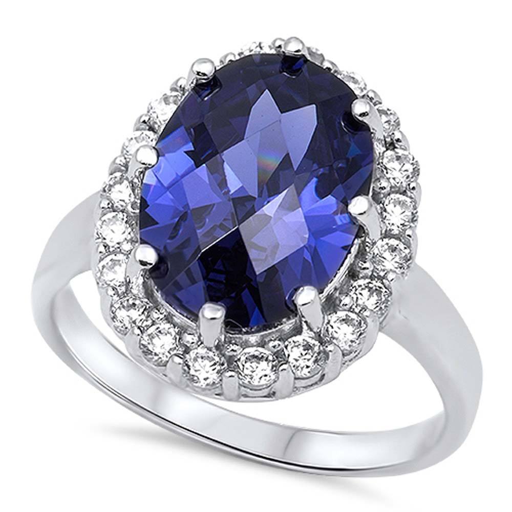 Sterling Silver Oval Shaped Blue Spinel And Clear CZ RingAnd Face Height 10mm