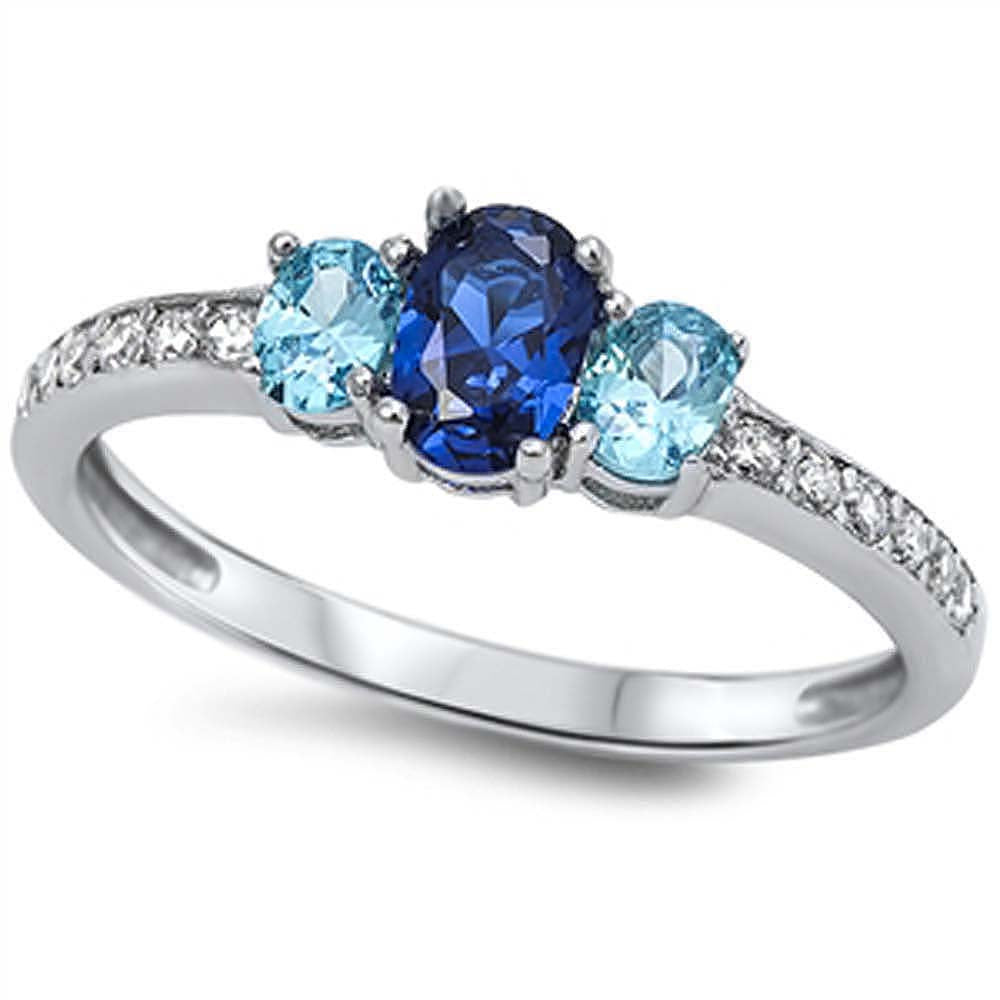 Sterling Silver Three Stone Blue Sapphire Oval With Blue Topaz CZ RingAnd Face Height 6mmAnd Band Width 3mm