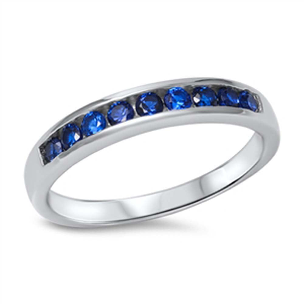 Sterling Silver Classy Round Cut Blue Sapphire Cz on Channel Setting Eternity Band Ring with Face Height of 4MMAnd Band Width: 3MM