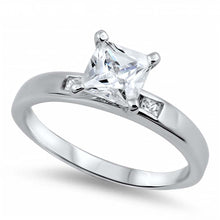 Load image into Gallery viewer, Sterling Silver Princess Cut Clear Solitaire Simulated Diamond Engagement Ring on Prong Setting with Small Channel Setting Side View Diamonds with Rhodium FinishAnd Face Height of 7mm