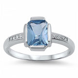 Sterling Silver Classy Radiant Cut Aquamarine Cz on Center and Clear Czs Inlaid on Band Ring with Face Height of 10MM