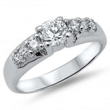 Sterling Silver Modish Solitaire Prong Set with Round Cut Clear Cz with Inlaid Czs on Band RingAnd Face Height of 5MM