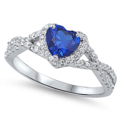 Sterling Silver Ring With Blue Sapphire Heart StoneAnd Decorated With- Clear CZ StonesAnd Face Height of 8MM
