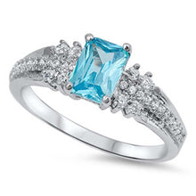 Load image into Gallery viewer, Sterling Silver Elegant Solitaire Prong Blue Topaz Cz Emerald Cut with Clear Cz Inlay RingAnd Face Height of 7MM