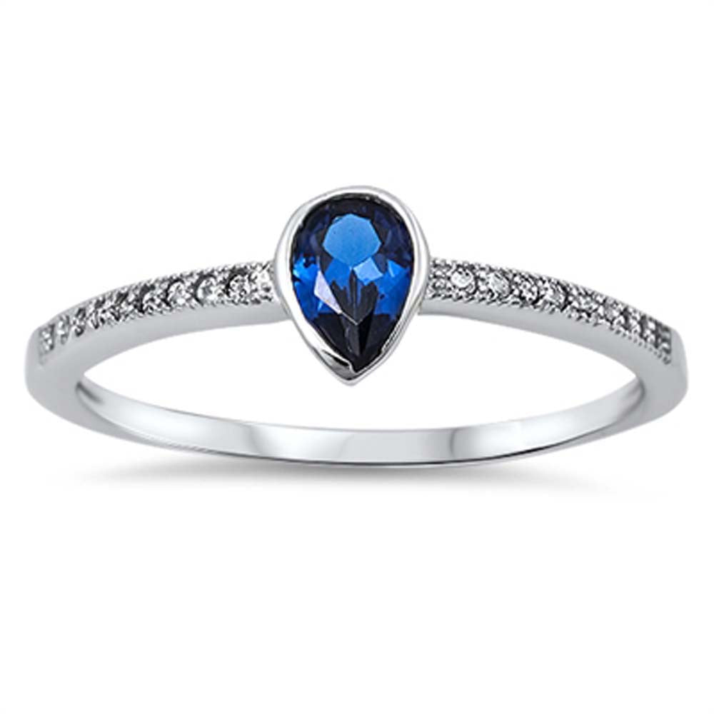 Sterling Silver Eternity Band with Clear Cz and Pearshape Blue Sapphire Cz RingAnd Face Height of 7MM