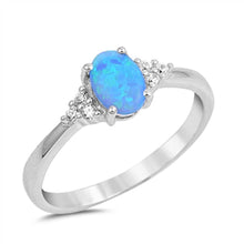 Load image into Gallery viewer, Sterling Silver Clear CZ Fancy Ring with a 4 Prong Set Oval Cut Blue Lab Opal in the CenterAnd Ring Face Height of 7MM